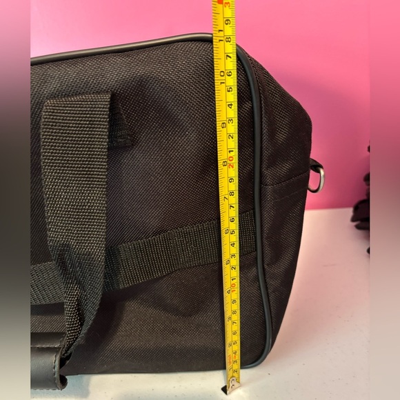 Black Travel Bag with Durable Fabric and Detachable Strap - Picture 6 of 11